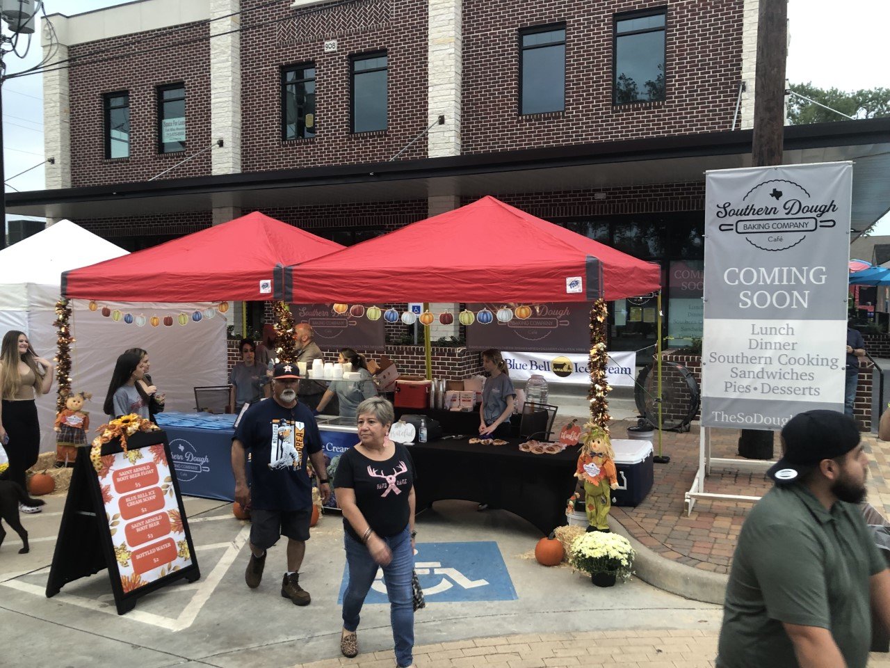 The Southern Dough Bakery expects to open next month in downtown Katy, but it was represented at the Katy Rice Festival, handing out free cookies.